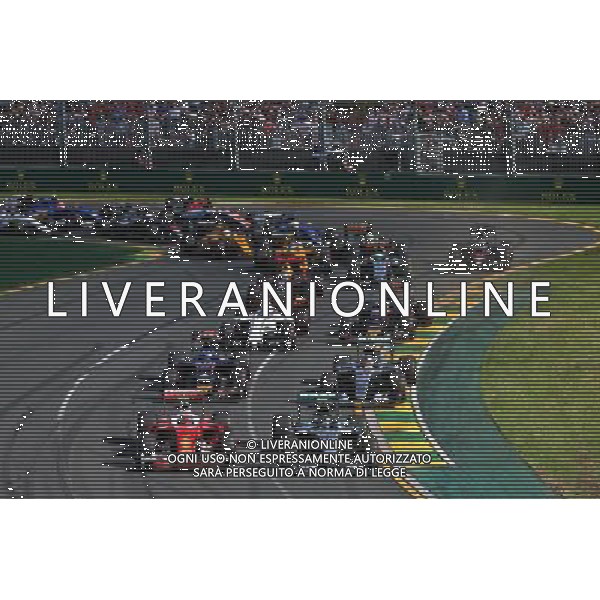 (L to R): Kimi Raikkonen (FIN) Ferrari SF16-H and Nico Rosberg (GER) Mercedes AMG F1 W07 Hybrid at the start of the race. 20.03.2016. Formula 1 World Championship, Rd 1, Australian Grand Prix, Albert Park, Melbourne, Australia, Race Day. - www.xpbimages.com, EMail: requests@xpbimages.com - copy of publication required for printed pictures. Every used picture is fee-liable. Â© Copyright: Batchelor / XPB Images/Agenzia Aldo Liverani s.a.s./ONLY ITALY/EDITORIAL USE ONLY