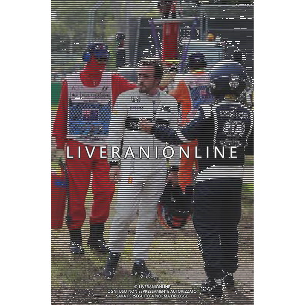 Fernando Alonso (ESP) McLaren with Gene Haas (USA) Haas Automotion President after his race stopping crash. 20.03.2016. Formula 1 World Championship, Rd 1, Australian Grand Prix, Albert Park, Melbourne, Australia, Race Day. - www.xpbimages.com, EMail: requests@xpbimages.com - copy of publication required for printed pictures. Every used picture is fee-liable. Â© Copyright: Charniaux / XPB Images/Agenzia Aldo Liverani s.a.s./ONLY ITALY/EDITORIAL USE ONLY
