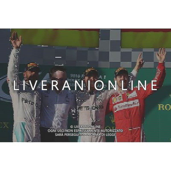 1st place Nico Rosberg (GER) Mercedes AMG Petronas F1 W07, 2nd place Lewis Hamilton (GBR) Mercedes AMG F1 W07 and 3rd place Sebastian Vettel (GER) Scuderia Ferrari SF16-H. 20.03.2016. Formula 1 World Championship, Rd 1, Australian Grand Prix, Albert Park, Melbourne, Australia, Race Day. - www.xpbimages.com, EMail: requests@xpbimages.com - copy of publication required for printed pictures. Every used picture is fee-liable. Â© Copyright: Batchelor / XPB Images/Agenzia Aldo Liverani s.a.s./ONLY ITALY/EDITORIAL USE ONLY