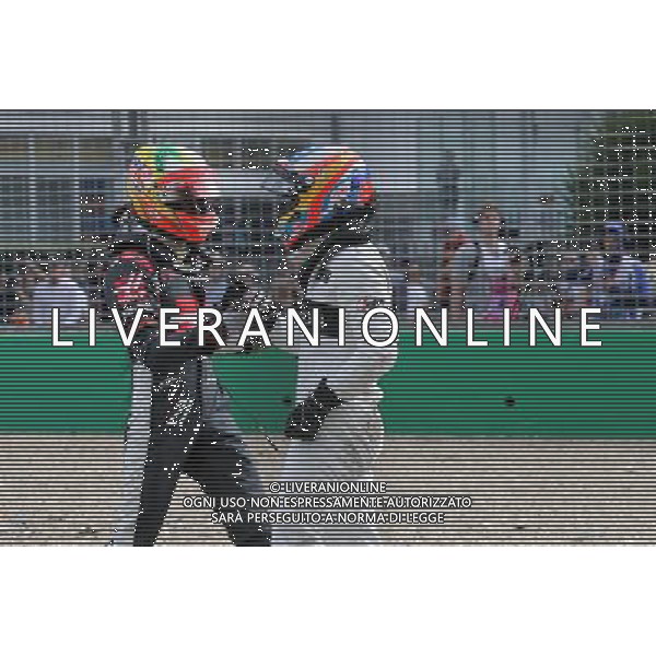 Esteban Gutierrez (MEX), Haas F1 Team and Fernando Alonso (ESP), McLaren Honda 20.03.2016. Formula 1 World Championship, Rd 1, Australian Grand Prix, Albert Park, Melbourne, Australia, Race Day. - www.xpbimages.com, EMail: requests@xpbimages.com - copy of publication required for printed pictures. Every used picture is fee-liable. Â© Copyright: Charniaux / XPB Images/Agenzia Aldo Liverani s.a.s./ONLY ITALY/EDITORIAL USE ONLY