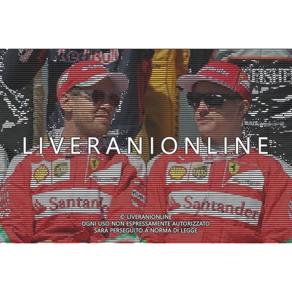 Sebastian Vettel (GER), Scuderia Ferrari and Kimi Raikkonen (FIN), Scuderia Ferrari 20.03.2016. Formula 1 World Championship, Rd 1, Australian Grand Prix, Albert Park, Melbourne, Australia, Race Day. / AGENZIA ALDO LIVERANI SAS - ITALY ONLY EDITORIAL USE ONLY