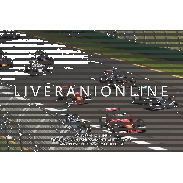 (L to R): Nico Rosberg (GER) Mercedes AMG F1 W07 Hybrid, Sebastian Vettel (GER) Ferrari SF16-H, and Lewis Hamilton (GBR) Mercedes AMG F1 W07 Hybrid at the start of the race. 20.03.2016. Formula 1 World Championship, Rd 1, Australian Grand Prix, Albert Park, Melbourne, Australia, Race Day. / AGENZIA ALDO LIVERANI SAS - ITALY ONLY EDITORIAL USE ONLY
