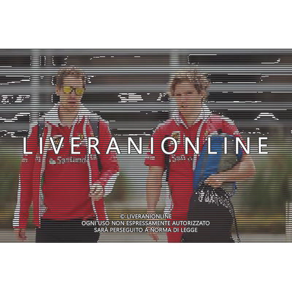 Sebastian Vettel (GER) Ferrari with Antti Kontsas (FIN) Personal Trainer. 01.04.2016. Formula 1 World Championship, Rd 2, Bahrain Grand Prix, Sakhir, Bahrain, Practice Day AG ALDO LIVERANI SAS ONLY ITALY