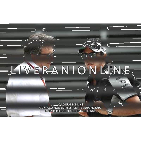 (L to R): Pasquale Lattuneddu (ITA) of the FOM with Sergio Perez (MEX) Sahara Force India F1. 01.04.2016. Formula 1 World Championship, Rd 2, Bahrain Grand Prix, Sakhir, Bahrain, Practice Day AG ALDO LIVERANI SAS ONLY ITALY