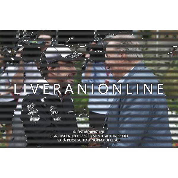 (L to R): Fernando Alonso (ESP) McLaren with Former Spanish King Juan Carlos. 01.04.2016. Formula 1 World Championship, Rd 2, Bahrain Grand Prix, Sakhir, Bahrain, Practice Day AG ALDO LIVERANI SAS ONLY ITALY
