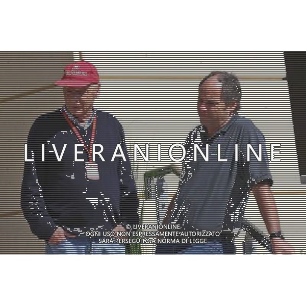 (L to R): Niki Lauda (AUT) Mercedes Non-Executive Chairman with Gerhard Berger (AUT). 02.04.2016. Formula 1 World Championship, Rd 2, Bahrain Grand Prix, Sakhir, Bahrain, Qualifying Day. AG ALDO LIVERANI SAS ONLY ITALY