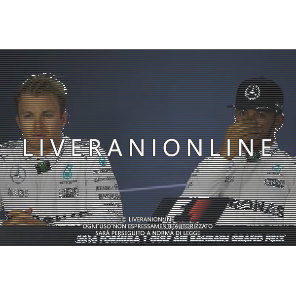 (L to R): Nico Rosberg (GER) Mercedes AMG F1 with team mate Lewis Hamilton (GBR) Mercedes AMG F1 in the FIA Press Conference. 02.04.2016. Formula 1 World Championship, Rd 2, Bahrain Grand Prix, Sakhir, Bahrain, Qualifying Day. AG ALDO LIVERANI SAS ONLY ITALY