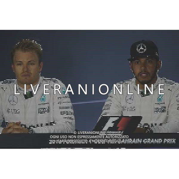(L to R): Nico Rosberg (GER) Mercedes AMG F1 with team mate Lewis Hamilton (GBR) Mercedes AMG F1 in the FIA Press Conference. 02.04.2016. Formula 1 World Championship, Rd 2, Bahrain Grand Prix, Sakhir, Bahrain, Qualifying Day. AG ALDO LIVERANI SAS ONLY ITALY