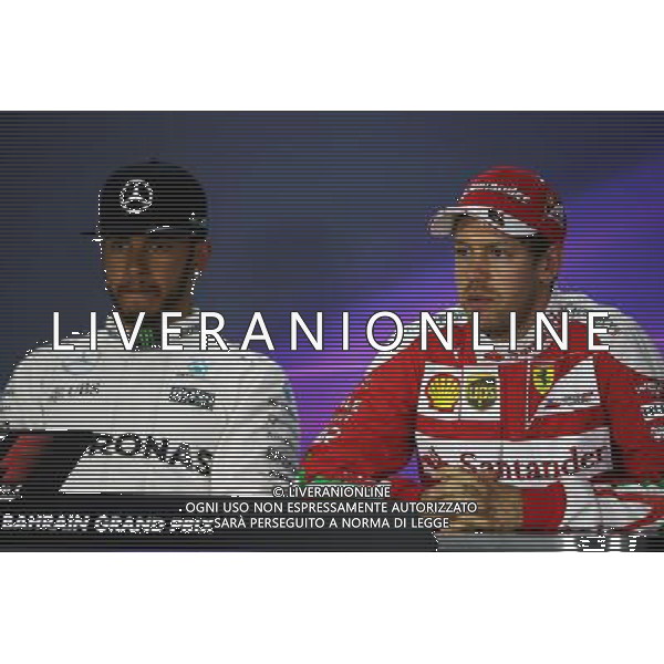 (L to R): Lewis Hamilton (GBR) Mercedes AMG F1 with Sebastian Vettel (GER) Ferrari in the FIA Press Conference. 02.04.2016. Formula 1 World Championship, Rd 2, Bahrain Grand Prix, Sakhir, Bahrain, Qualifying Day. AG ALDO LIVERANI SAS ONLY ITALY