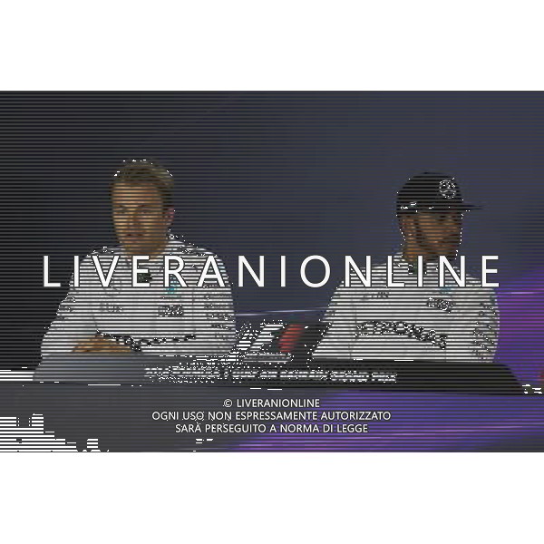 (L to R): Nico Rosberg (GER) Mercedes AMG F1 and team mate Lewis Hamilton (GBR) Mercedes AMG F1 in the FIA Press Conference. 02.04.2016. Formula 1 World Championship, Rd 2, Bahrain Grand Prix, Sakhir, Bahrain, Qualifying Day. AG ALDO LIVERANI SAS ONLY ITALY