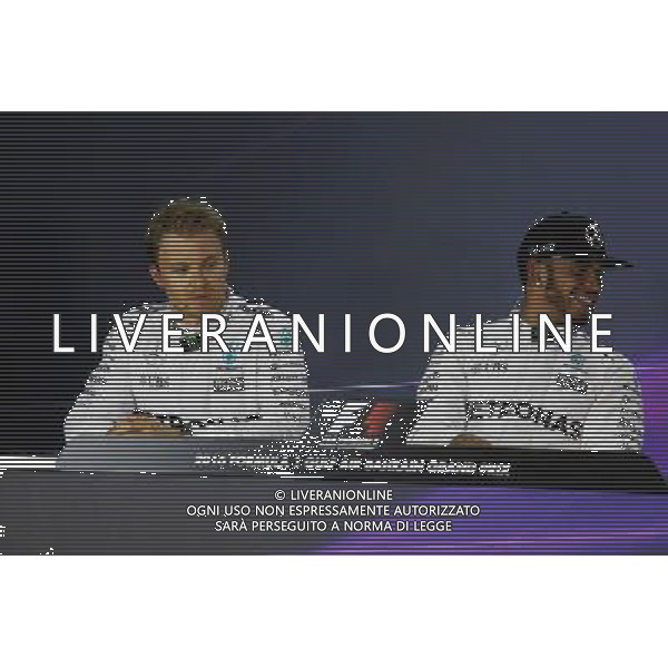 (L to R): Nico Rosberg (GER) Mercedes AMG F1 and team mate Lewis Hamilton (GBR) Mercedes AMG F1 in the FIA Press Conference. 02.04.2016. Formula 1 World Championship, Rd 2, Bahrain Grand Prix, Sakhir, Bahrain, Qualifying Day. AG ALDO LIVERANI SAS ONLY ITALY