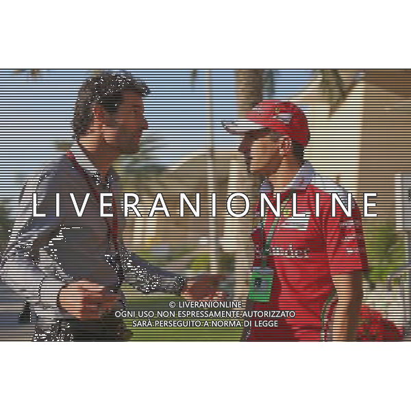 (L to R): Mark Webber (AUS) Porsche Team WEC Driver / Channel 4 Presenter with Marc Gene (ESP) Ferrari Test Driver. 03.04.2016. Formula 1 World Championship, Rd 2, Bahrain Grand Prix, Sakhir, Bahrain, Race Day. AG ALDO LIVERANI SAS ONLY ITALY