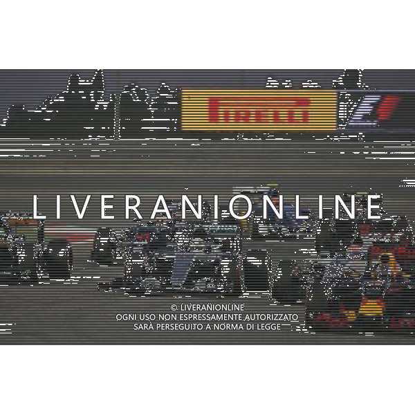 Lewis Hamilton (GBR) Mercedes AMG F1 W07 Hybrid after making contact with Valtteri Bottas (FIN) Williams FW38 at the start of the race. 03.04.2016. Formula 1 World Championship, Rd 2, Bahrain Grand Prix, Sakhir, Bahrain, Race Day. AG ALDO LIVERANI SAS ONLY ITALY