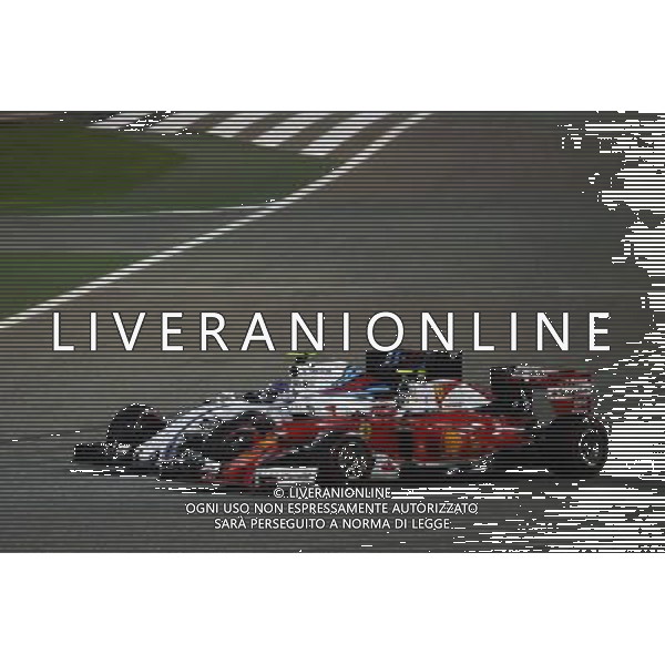 Kimi Raikkonen (FIN) Ferrari SF16-H and Valtteri Bottas (FIN) Williams FW38 battle for position. 03.04.2016. Formula 1 World Championship, Rd 2, Bahrain Grand Prix, Sakhir, Bahrain, Race Day. AG ALDO LIVERANI SAS ONLY ITALY