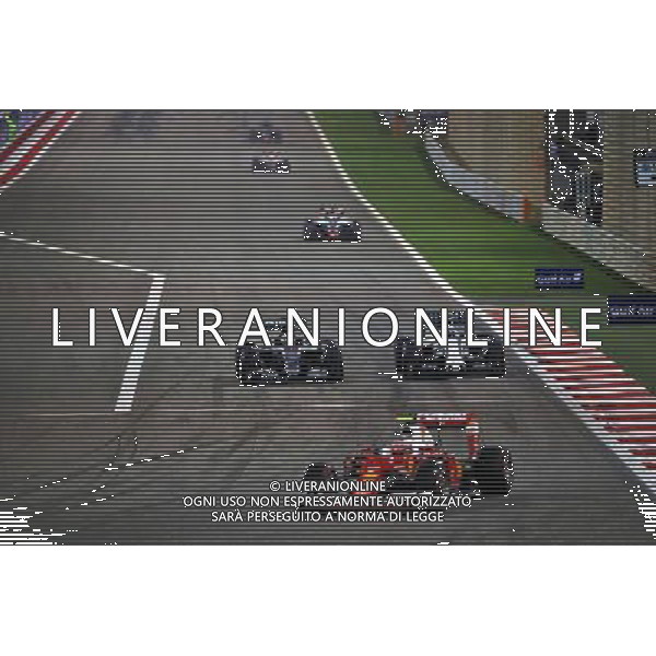 Lewis Hamilton (GBR) Mercedes AMG F1 W07 Hybrid and Valtteri Bottas (FIN) Williams FW38 battle for position behind Kimi Raikkonen (FIN) Ferrari SF16-H. 03.04.2016. Formula 1 World Championship, Rd 2, Bahrain Grand Prix, Sakhir, Bahrain, Race Day. AG ALDO LIVERANI SAS ONLY ITALY