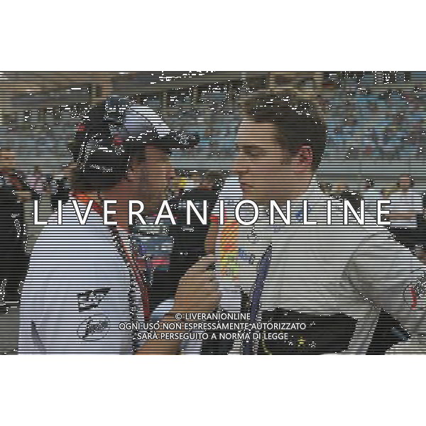 Fernando Alonso (ESP), McLaren Honda and Stoffel Vandoorne (BEL), third driver, McLaren F1 Team 03.04.2016. Formula 1 World Championship, Rd 2, Bahrain Grand Prix, Sakhir, Bahrain, Race Day. AG ALDO LIVERANI SAS ONLY ITALY