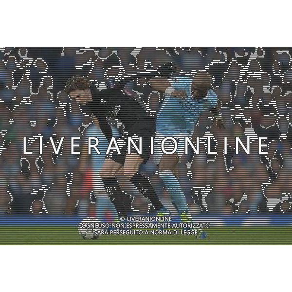 Manchester City\'s Eliaquim Mangala battles with Paris Saint-Germain\'s Adrien Rabiot Photographer Dave Howarth/CameraSport Football - UEFA Champions League Quarter Final Second Leg - Manchester City v Paris Saint-Germain - Tuesday 12th April 2016 - Etihad Stadium - Manchester © CameraSport - 43 Linden Ave. Countesthorpe. Leicester. England. LE8 5PG - Tel: +44 (0) 116 277 4147 - admin@camerasport.com - www.camerasport.com AG ALDO LIVERANI SAS ONLY ITALY