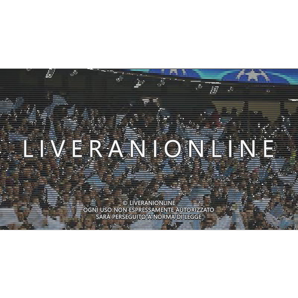 Manchester City fans wave flags to celebrate the goal of Kevin De Bruyne Photographer Dave Howarth/CameraSport Football - UEFA Champions League Quarter Final Second Leg - Manchester City v Paris Saint-Germain - Tuesday 12th April 2016 - Etihad Stadium - Manchester © CameraSport - 43 Linden Ave. Countesthorpe. Leicester. England. LE8 5PG - Tel: +44 (0) 116 277 4147 - admin@camerasport.com - www.camerasport.com AG ALDO LIVERANI SAS ONLY ITALY
