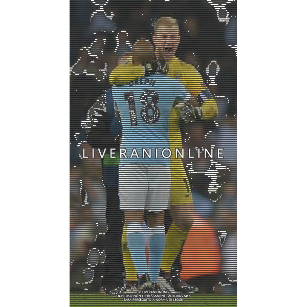 Manchester City\'s Joe Hart celebrates with Fabian Delph at the final whistle Photographer Dave Howarth/CameraSport Football - UEFA Champions League Quarter Final Second Leg - Manchester City v Paris Saint-Germain - Tuesday 12th April 2016 - Etihad Stadium - Manchester © CameraSport - 43 Linden Ave. Countesthorpe. Leicester. England. LE8 5PG - Tel: +44 (0) 116 277 4147 - admin@camerasport.com - www.camerasport.com AG ALDO LIVERANI SAS ONLY ITALY