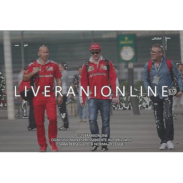 Kimi Raikkonen (FIN) Ferrari with Mark Arnall (GBR) Personal Trainer (Left). 15.04.2016. Formula 1 World Championship, Rd 3, Chinese Grand Prix, Shanghai, China, Practice Day. - www.xpbimages.com, EMail: requests@xpbimages.com - copy of publication required for printed pictures. Every used picture is fee-liable. © Copyright: Bearne / XPB Images /Agenzia Aldo Liverani s.a.s./ONLY ITALY-EDITORIAL USE ONLY