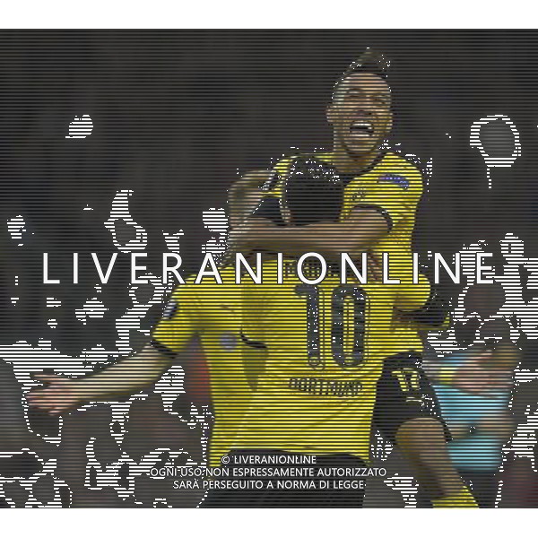Borussia Dortmund\'s Henrikh Mkhitaryan is congratulated on scoring his team\'s first goal by team mate Pierre-Emerick Aubameyang Photographer Dave Howarth/CameraSport Football - UEFA Europa League Quarter Final Second Leg - Liverpool v Borussia Dortmund - Thursday 14th April 2016 - Anfield - Liverpool Â© CameraSport - 43 Linden Ave. Countesthorpe. Leicester. England. LE8 5PG - Tel: +44 (0) 116 277 4147 - admin@camerasport.com - www.camerasport.com /Agenzia Aldo Liverani s.a.s./ONLY ITALY-EDITORIAL USE ONLY