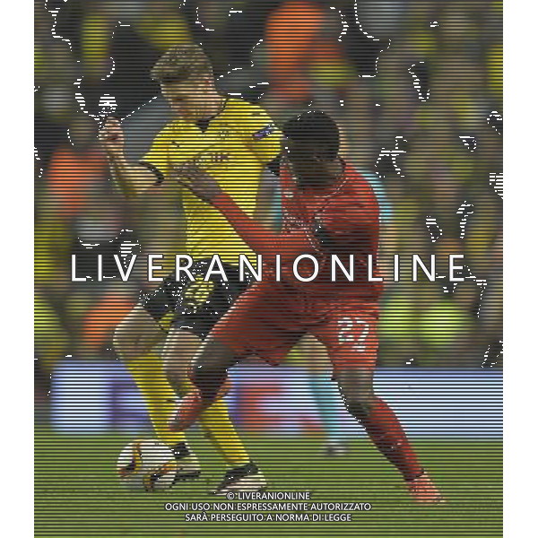 Liverpool\'s Divock Origi battles with Borussia Dortmund\'s Lukasz Piszczek Photographer Dave Howarth/CameraSport Football - UEFA Europa League Quarter Final Second Leg - Liverpool v Borussia Dortmund - Thursday 14th April 2016 - Anfield - Liverpool Â© CameraSport - 43 Linden Ave. Countesthorpe. Leicester. England. LE8 5PG - Tel: +44 (0) 116 277 4147 - admin@camerasport.com - www.camerasport.com /Agenzia Aldo Liverani s.a.s./ONLY ITALY-EDITORIAL USE ONLY