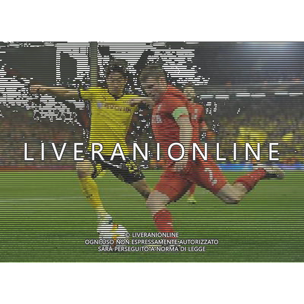 Borussia Dortmund\'s Shinji Kagawa battles with Liverpool\'s James Milner Photographer Dave Howarth/CameraSport Football - UEFA Europa League Quarter Final Second Leg - Liverpool v Borussia Dortmund - Thursday 14th April 2016 - Anfield - Liverpool Â© CameraSport - 43 Linden Ave. Countesthorpe. Leicester. England. LE8 5PG - Tel: +44 (0) 116 277 4147 - admin@camerasport.com - www.camerasport.com /Agenzia Aldo Liverani s.a.s./ONLY ITALY-EDITORIAL USE ONLY