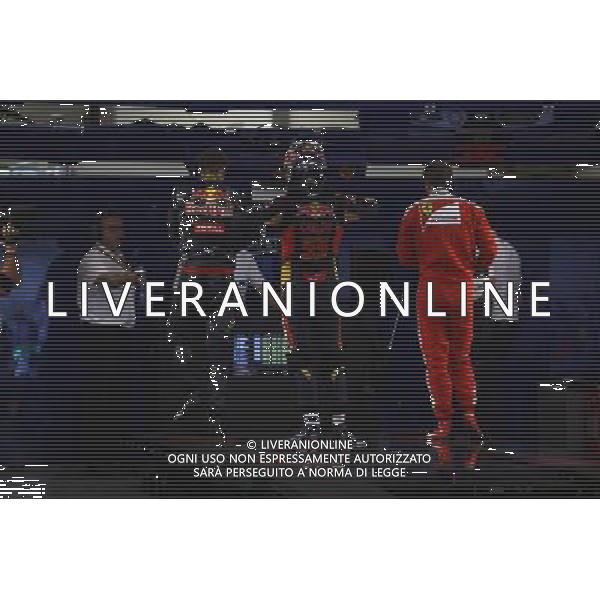 (L to R): Daniil Kvyat (RUS) Red Bull Racing; Carlos Sainz Jr (ESP) Scuderia Toro Rosso; and Sebastian Vettel (GER) Ferrari in parc ferme. 16.04.2016. Formula 1 World Championship, Rd 3, Chinese Grand Prix, Shanghai, China, Qualifying Day. /AGENZIA ALDO LIVERANI SAS - ITALY ONLY - EDITORIAL USE ONLY