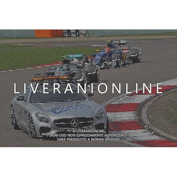 Nico Rosberg (GER) Mercedes AMG F1 W07 Hybrid leads behind the FIA Safety Car. 17.04.2016. Formula 1 World Championship, Rd 3, Chinese Grand Prix, Shanghai, China, Race Day. AG ALDO LIVERANI SAS ONLY ITALY