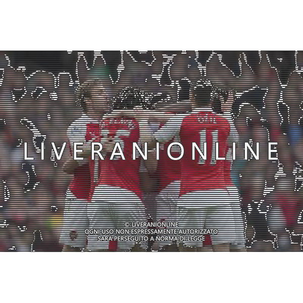 GOAL CELEBRATION - Arsenal\'s Alexis Sanchez celebrates scoring the opening goal with team mates Photographer Craig Mercer/CameraSport Football - Barclays Premiership - Arsenal v Crystal Palace - Sunday 17th April 2016 - Emirates Stadium - London © CameraSport - 43 Linden Ave. Countesthorpe. Leicester. England. LE8 5PG - Tel: +44 (0) 116 277 4147 - admin@camerasport.com - www.camerasport.com AG ALDO LIVERANI SAS ONLY ITALY