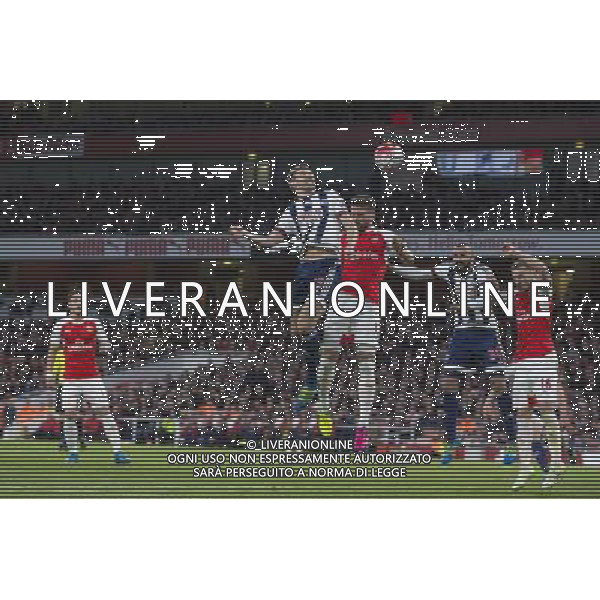 West Bromwich Albion\'s Gareth McAuley gets a header on goal Photographer Craig Mercer/CameraSport Football - Barclays Premiership - Arsenal v West Bromwich Albion - Thursday 21st April 2016 - Emirates Stadium - London © CameraSport - 43 Linden Ave. Countesthorpe. Leicester. England. LE8 5PG - Tel: +44 (0) 116 277 4147 - admin@camerasport.com - www.camerasport.com AG ALDO LIVERANI SAS ONLY ITALY