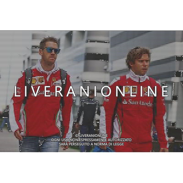 (L to R): Sebastian Vettel (GER) Ferrari with Antti Kontsas (FIN) Personal Trainer. 29.10.2016. Formula 1 World Championship, Rd 4, Russian Grand Prix, Sochi Autodrom, Sochi, Russia, Practice Day. - www.xpbimages.com, EMail: requests@xpbimages.com - copy of publication required for printed pictures. Every used picture is fee-liable. Â© Copyright: Batchelor / XPB Images/Agenzia Aldo Liverani s.a.s./ONLY ITALY/EDITORIAL USE ONLY