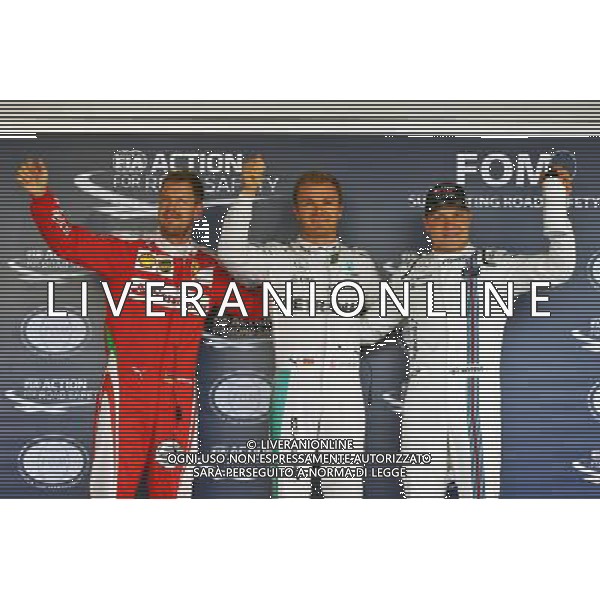 Qualifying top three in parc ferme (L to R): Sebastian Vettel (GER) Ferrari, second; Nico Rosberg (GER) Mercedes AMG F1, pole position; Valtteri Bottas (FIN) Williams, third. 30.04.2016. Formula 1 World Championship, Rd 4, Russian Grand Prix, Sochi Autodrom, Sochi, Russia, Qualifying Day. / AGENZIA ALDO LIVERANI SAS - ITALY ONLY EDITORIAL USE ONLY