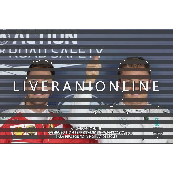 Sebastian Vettel (GER), Scuderia Ferrari and Nico Rosberg (GER), Mercedes AMG F1 Team 30.04.2016. Formula 1 World Championship, Rd 4, Russian Grand Prix, Sochi Autodrom, Sochi, Russia, Qualifying Day. AG ALDO LIVERANI SAS ONLY ITALY