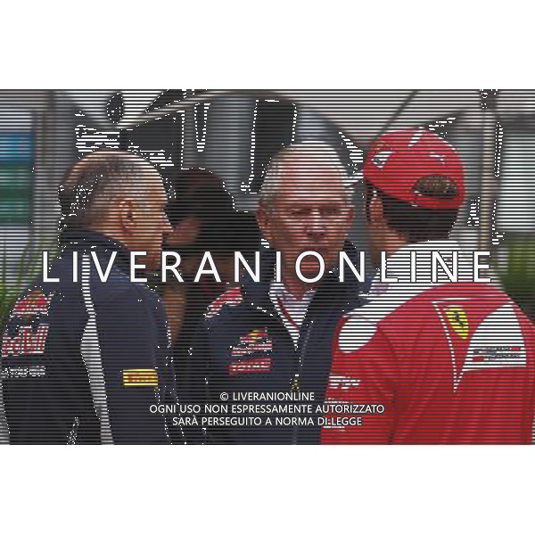 (L to R): Franz Tost (AUT) Scuderia Toro Rosso Team Principal with Dr Helmut Marko (AUT) Red Bull Motorsport Consultant and Jean-Eric Vergne (FRA) Ferrari Test and Development Driver. 30.04.2016. Formula 1 World Championship, Rd 4, Russian Grand Prix, Sochi Autodrom, Sochi, Russia, Qualifying Day. AG ALDO LIVERANI SAS ONLY ITALY