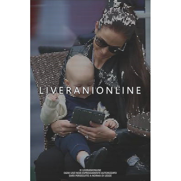 Minttu Virtanen (FIN), wife of Kimi Raikkonen (FIN) Ferrari, with their baby son Robin. 30.04.2016. Formula 1 World Championship, Rd 4, Russian Grand Prix, Sochi Autodrom, Sochi, Russia, Qualifying Day. AG ALDO LIVERANI SAS ONLY ITALY