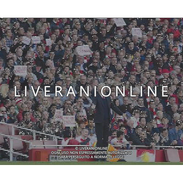 Arsenal fans hold up banners saying \'Time for Change\' behind Arsenal manager Arsne Wenger in protest against the current management and board at the club Photographer Craig Mercer/CameraSport Football - Barclays Premiership - Arsenal v Norwich City - Saturday 30th April 2016 - Emirates stadium - London © CameraSport - 43 Linden Ave. Countesthorpe. Leicester. England. LE8 5PG - Tel: +44 (0) 116 277 4147 - admin@camerasport.com - www.camerasport.com AG ALDO LIVERANI SAS ONLY ITALY