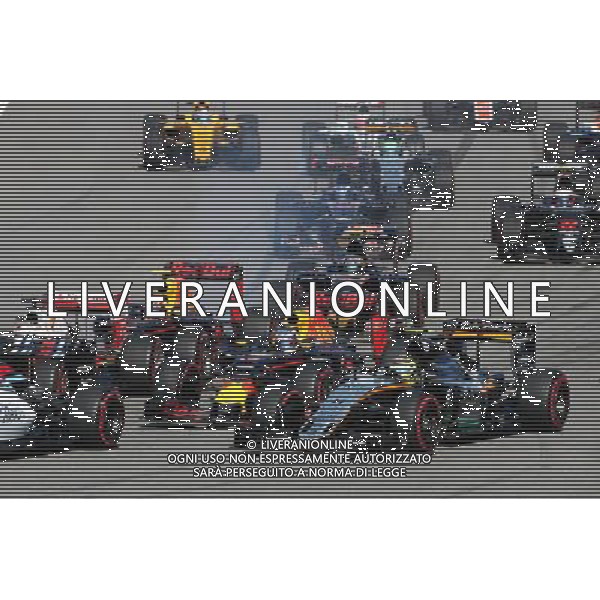 Start crash involvng Sebastian Vettel (GER) Ferrari SF16-H; Daniil Kvyat (RUS) Red Bull Racing RB12; Daniel Ricciardo (AUS) Red Bull Racing RB12; and Sergio Perez (MEX) Sahara Force India F1 VJM09. 01.05.2016. Formula 1 World Championship, Rd 4, Russian Grand Prix, Sochi Autodrom, Sochi, Russia, Race Day. AG ALDO LIVERANI SAS ONLY ITALY