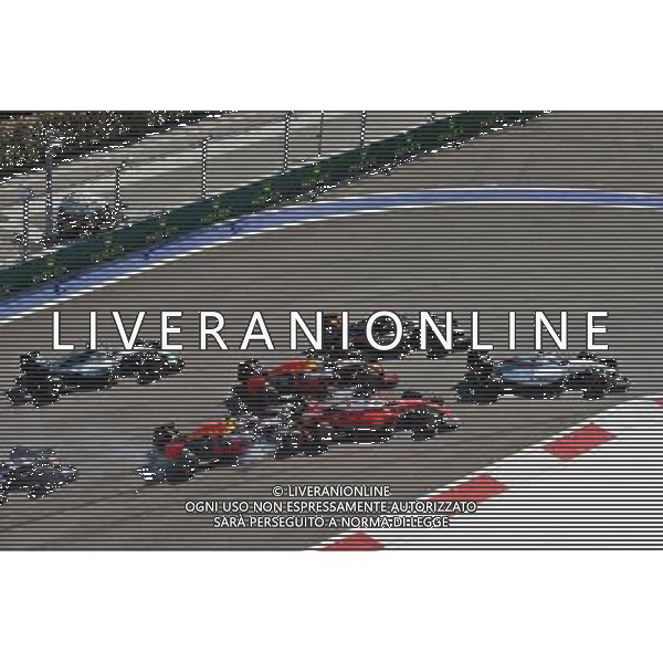 Daniil Kvyat (RUS) Red Bull Racing RB12 crashes into Sebastian Vettel (GER) Ferrari SF16-H at the start of the race. 01.05.2016. Formula 1 World Championship, Rd 4, Russian Grand Prix, Sochi Autodrom, Sochi, Russia, Race Day. AG ALDO LIVERANI SAS ONLY ITALY