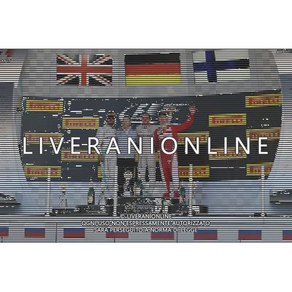 The podium (L to R): Lewis Hamilton (GBR) Mercedes AMG F1, second; Nico Rosberg (GER) Mercedes AMG F1, race winner; Kimi Raikkonen (FIN) Ferrari, third. 01.05.2016. Formula 1 World Championship, Rd 4, Russian Grand Prix, Sochi Autodrom, Sochi, Russia, Race Day. AG ALDO LIVERANI SAS ONLY ITALY