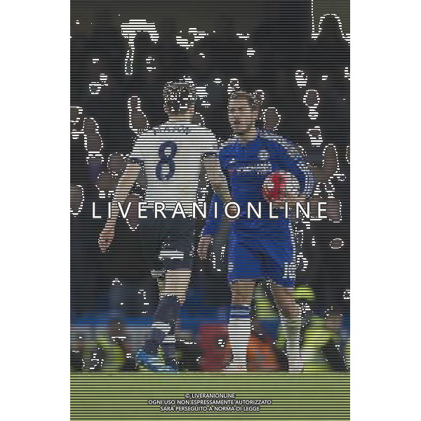 Chelsea\'s Eden Hazard reacts angrily to a challenge from behind by Tottenham Hotspur\'s Ryan Mason Photographer Craig Mercer/CameraSport Football - Barclays Premiership - Chelsea v Tottenham Hotspur - Monday 2nd May 2016 - Stamford Bridge - London © CameraSport - 43 Linden Ave. Countesthorpe. Leicester. England. LE8 5PG - Tel: +44 (0) 116 277 4147 - admin@camerasport.com - www.camerasport.com AG ALDO LIVERANI SAS ONLY ITALY