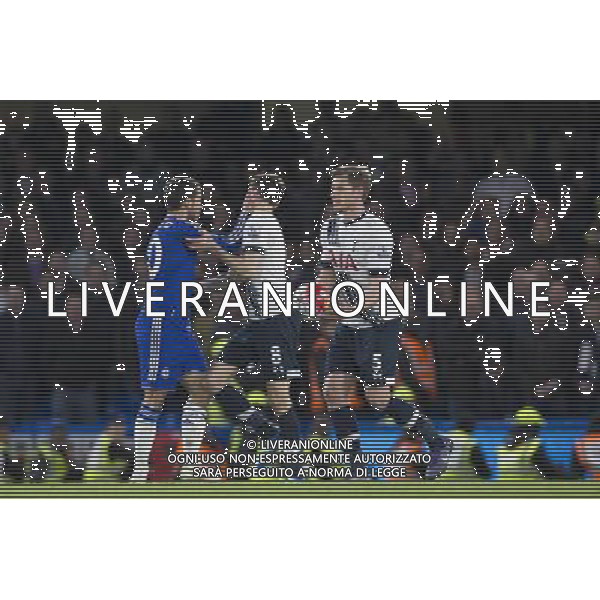 Chelsea\'s Eden Hazard reacts angrily to a challenge from behind by Tottenham Hotspur\'s Ryan Mason, and appears to push him away in the face Photographer Craig Mercer/CameraSport Football - Barclays Premiership - Chelsea v Tottenham Hotspur - Monday 2nd May 2016 - Stamford Bridge - London © CameraSport - 43 Linden Ave. Countesthorpe. Leicester. England. LE8 5PG - Tel: +44 (0) 116 277 4147 - admin@camerasport.com - www.camerasport.com AG ALDO LIVERANI SAS ONLY ITALY