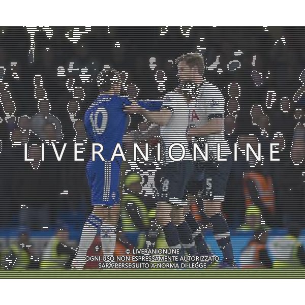 Chelsea\'s Eden Hazard reacts angrily to a challenge from behind by Tottenham Hotspur\'s Ryan Mason, and appears to push him away in the face Photographer Craig Mercer/CameraSport Football - Barclays Premiership - Chelsea v Tottenham Hotspur - Monday 2nd May 2016 - Stamford Bridge - London © CameraSport - 43 Linden Ave. Countesthorpe. Leicester. England. LE8 5PG - Tel: +44 (0) 116 277 4147 - admin@camerasport.com - www.camerasport.com AG ALDO LIVERANI SAS ONLY ITALY