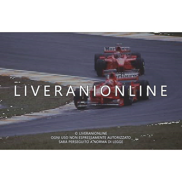 RETROSPETTIVA MICHAEL SCHUMACHER PILOTA NELLA FOTO MICHAEL SCHUMACHER CON EDDIE IRVINE NEL 1998 AG ALDO LIVERANI SAS