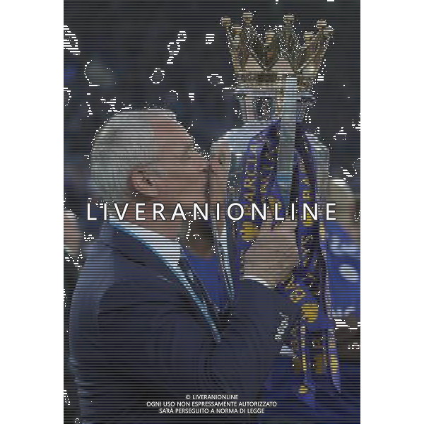 Claudio Ranieri kisses the Barclays premiership Trophy during the celebrations at the end of todays game Photographer Rachel Holborn/CameraSport Football - Barclays Premiership - Leicester City v Everton - Saturday 7th May 2016 - King Power Stadium - Leicester Â© CameraSport - 43 Linden Ave. Countesthorpe. Leicester. England. LE8 5PG - Tel: +44 (0) 116 277 4147 - admin@camerasport.com - www.camerasport.com / AGENZIA ALDO LIVERANI SAS - ITALY ONLY EDITORIAL USE ONLY