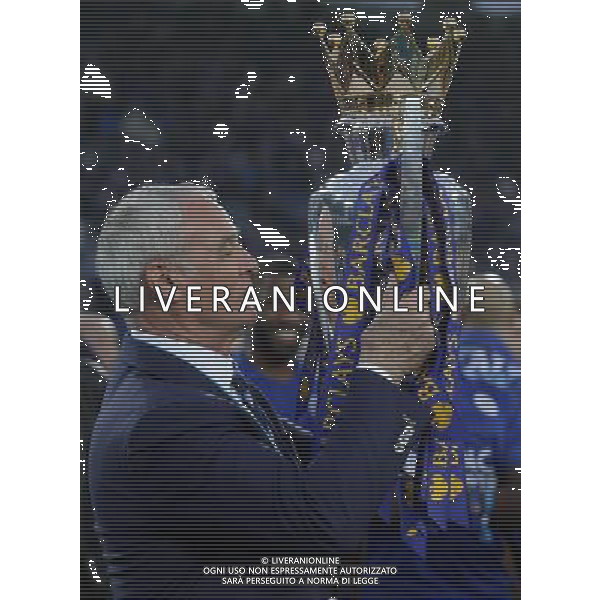 Claudio Ranieri kisses the Barclays premiership Trophy during the celebrations at the end of todays game Photographer Rachel Holborn/CameraSport Football - Barclays Premiership - Leicester City v Everton - Saturday 7th May 2016 - King Power Stadium - Leicester Â© CameraSport - 43 Linden Ave. Countesthorpe. Leicester. England. LE8 5PG - Tel: +44 (0) 116 277 4147 - admin@camerasport.com - www.camerasport.com / AGENZIA ALDO LIVERANI SAS - ITALY ONLY EDITORIAL USE ONLY