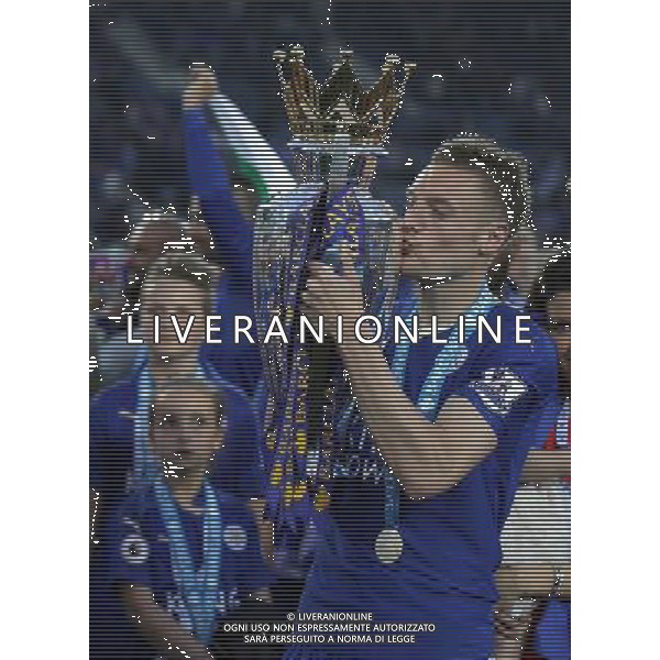 Leicester City\'s Jamie Vardy kisses the Barclays premiership Trophy during the celebrations at the end of todays game Photographer Rachel Holborn/CameraSport Football - Barclays Premiership - Leicester City v Everton - Saturday 7th May 2016 - King Power Stadium - Leicester Â© CameraSport - 43 Linden Ave. Countesthorpe. Leicester. England. LE8 5PG - Tel: +44 (0) 116 277 4147 - admin@camerasport.com - www.camerasport.com / AGENZIA ALDO LIVERANI SAS - ITALY ONLY EDITORIAL USE ONLY