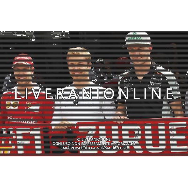 (L to R): Sebastian Vettel (GER) Ferrari; Nico Rosberg (GER) Mercedes AMG F1; and Nico Hulkenberg (GER) Sahara Force India F1, promote the return of the German Grand Prix. 12.05.2016. Formula 1 World Championship, Rd 5, Spanish Grand Prix, Barcelona, Spain, Preparation Day. - www.xpbimages.com, EMail: requests@xpbimages.com - copy of publication required for printed pictures. Every used picture is fee-liable. © Copyright: Photo4 / XPB Images /Agenzia Aldo Liverani s.a.s./ONLY ITALY-EDITORIAL USE ONLY