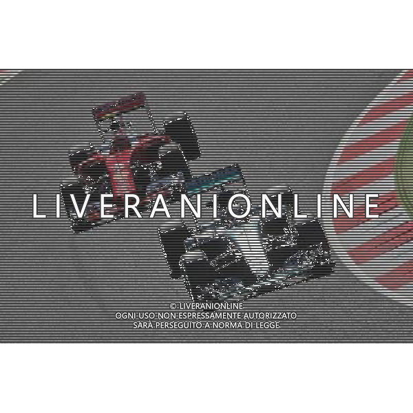 Lewis Hamilton (GBR) Mercedes AMG F1 W07 Hybrid leads Kimi Raikkonen (FIN) Ferrari SF16-H. 13.05.2016. Formula 1 World Championship, Rd 5, Spanish Grand Prix, Barcelona, Spain, Practice Day. AG ALDO LIVERANI SAS ONLY ITALY