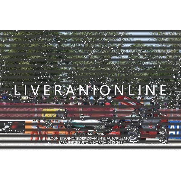 The Mercedes AMG F1 W07 Hybrid of race retiree Nico Rosberg (GER) Mercedes AMG F1 is craned away from the gravel trap at the start of the race. 15.05.2016. Formula 1 World Championship, Rd 5, Spanish Grand Prix, Barcelona, Spain, Race Day. AG ALDO LIVERANI SAS ONLY ITALY
